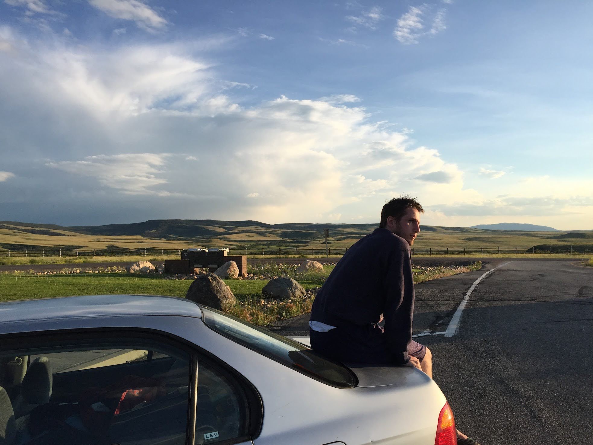 Sitting on the back of the car that took us to 200+ camps - 2012